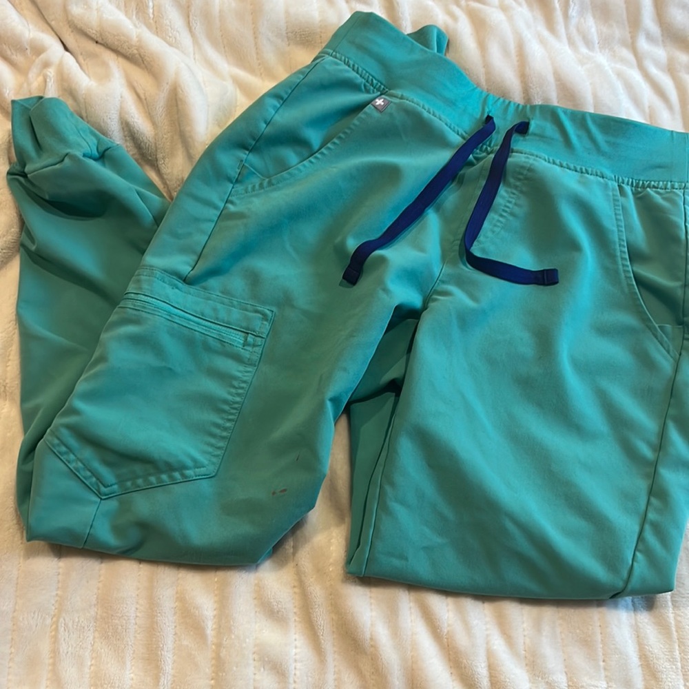 Surgical green joggers.